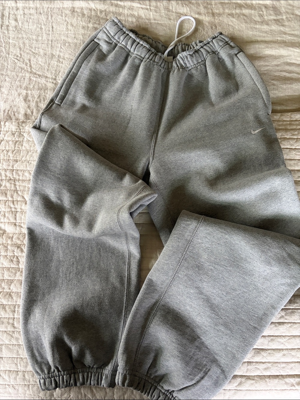 Women’s Nike Solo Swoosh fleece pants